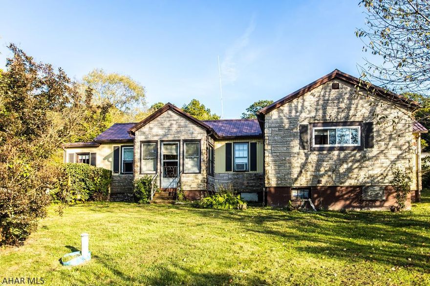 Cozy 2 bedroom 1 bath house. Nice, large yard. Garage. Great location. Close to I-99 for a quick commute to Altoona or State College.