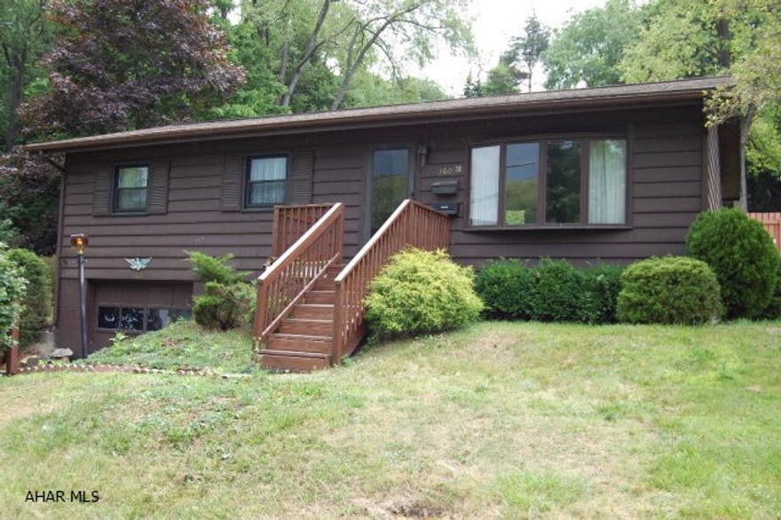 Location! Location! Act fast on this 3 bedroom, 1 bath raised ranch style house.  One car garage, central air.  Fireplace in living room, sliding glass doors that lead out onto a patio from the dining room.  Schedule a showing today before this one is gone.