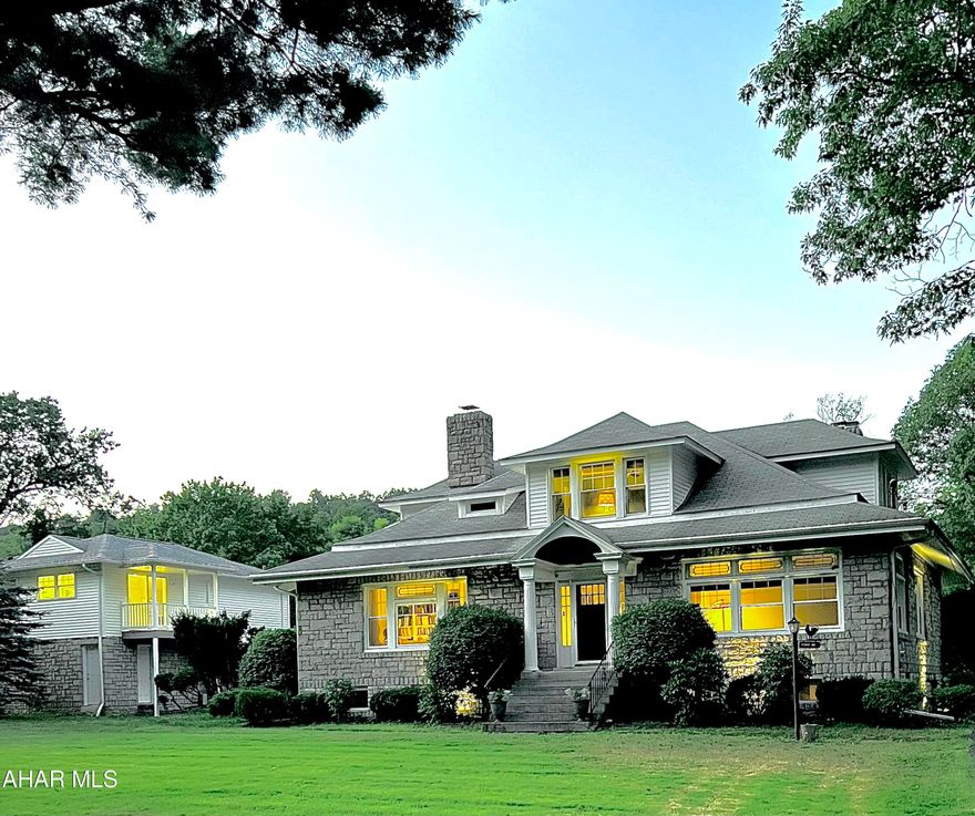 Rare and beautiful Greystone home with detached two car garage with guest house. This private Home sits on 1.52 acres and has its own Circular driveway to Aurora Lane.  Home features laundry and hook ups on two floors.  Home showcases two wood fireplaces, one of which is recognized for being crafted with stones from all over the world.  Home has many updates and includes three bedrooms, four baths, custom hardwood flooring throughout, built in book cases, walkout basement including recreation room, bar and den. Completely remodeled guest house with granite counter tops for guests or rental.  Contact listing agent today!