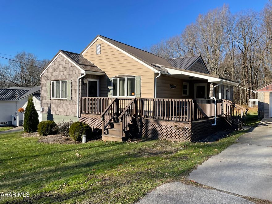 This immaculately kept property has spacious rooms and is ready for entertaining family and friends this holiday season. Have guests kick off their shoes in the updated Mudroom/laundry room, then bring them into the spacious kitchen area which has been renovated and features include plenty of cabinets for storage, and counters for preparing meals, a large coffee bar can be used as a buffet table while entertaining.  Appliances do stay.  The dining room can accommodate a large table and the floor plan is open to the kitchen and living areas.  When guests leave you can curl up to watch a movie by the pellet stove in the living room. All three spacious bedrooms are off of the kitchen and there is plenty of room for storage. You will enjoy getting ready in the renovated bath. This home has new roof, furnace, AC just to name a few of the improvements current owners have made to this home. Keep your car covered this winter in the garage,  and enjoy the large L shaped over a half acre lot. Cleanest house in Blacklick Valley! Come look today!