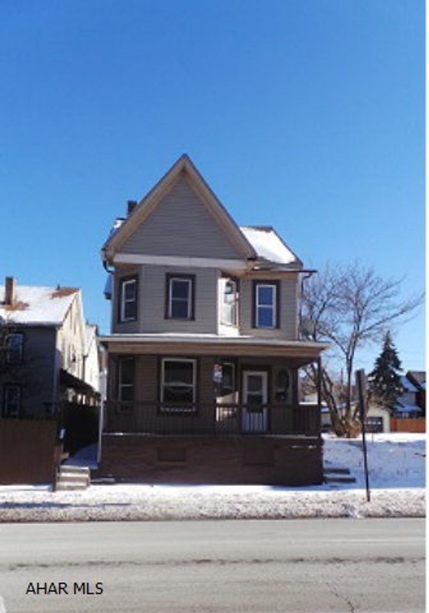 Good mechanics, vinyl siding, windows and roof 2007. Electric bx updated 2013. 3 Bedroom, 2 baths. Inside needs some updating and TLC. Off street parking in rear.