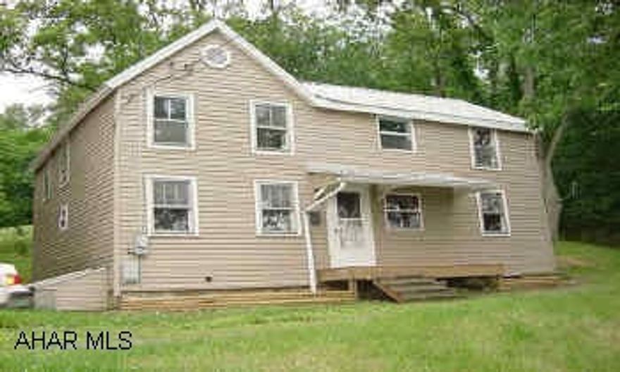 Maintenance free home with vinyl siding, newer metal roof, all new flooring, wiring, plumbing, heaters, hot water heater, bathrooms, and fixtures. Maintenance free home with vinyl siding, newer metal roof, all new flooring, wiring, plumbing, heaters, hot water heater, bathrooms and fixtures.