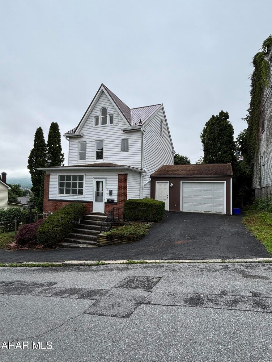 Move right into this 4 bedroom 1.5 bath home!! As you enter this large home you will find a bright bonus room with built in shelves leading to the living room and dining room. The kitchen is spacious with additional countertop area great for a coffee station, 1st floor laundry and a 1/2 bath completes the main floor. The 2nd floor offers 3 bedrooms and full bath and the 4th bedroom is located on the nicely finished 3rd floor. Enjoy grilling on the large deck overlooking the oversized fenced yard. Keep your outdoor maintenance equipment safely stowed away in brick storage shed. Don't wait!! Call today to see this lovely home before it's too late.