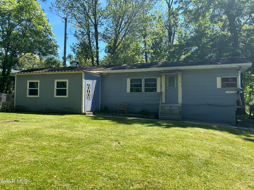 2 Bedroom 1 Bath Single Wide Mobile home on 1/4 acre Lot,Fenced Yard ,2 nice storage sheds ,home is in livable condition with some recent new flooring and fresh paint.would make a nice rental property or could remove the trailer to build on the site or Replace with a modern year Mobile home,There is no lot rent you own the land,Title has been retired.House is on Plateau St. not on Pleasant Valley Blvd!
