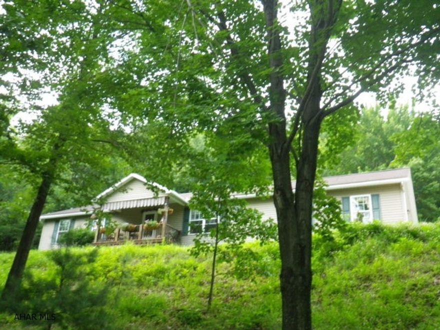 Well maintained 3 BR ranch on over half an acre secluded in the country. Custom kitchen with appliances. 3 baths. Family room and extra den. Whirlpool tub. 2 car garage & concrete driveway