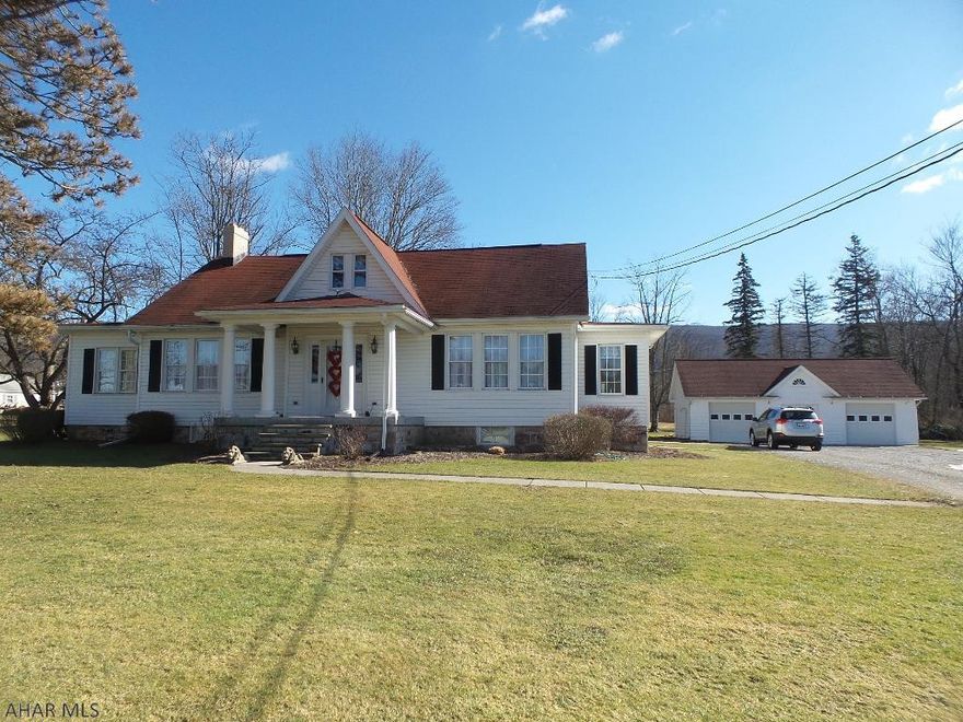 Historic structure that has been transformed into a beautiful one story home.  Beautifully updated with new kitchen trimmed in tile and stainless steel.  It offers all appliances, and island with gourmet sink, and a lot of natural light coming thru the large new windows.  The home also features a huge formal dining room with hardwood floor and chandelier.  Enjoy the bright and happy sun room all year round with the fireplace.  Two spacious bedrooms each with hardwood and closet space.  The finished walk-out basement offers a great family space with a kitchenette, fireplace and storage.  The back room of the basement is where the laundry is located along with an abundance of storage area. 2+ car garage, 1.8 acres, small trout stream.  Don't miss this rare Antis-Township opportunity!