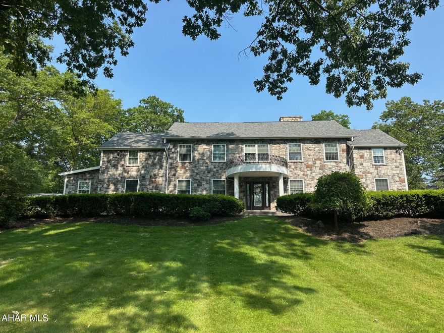 STUNNING GRAND ESTATE IN HOLLIDAYSBURG!
Welcome to this exceptional 5 bedroom, 6 bathroom home offering luxurious living both indoors and out. Perfectly designed for entertaining, the home boasts a superb kitchen with large island and granite countertops. The formal living and dining room provide elegant spaces for gatherings, while recessed lighting and zoned heating throughout add comfort and convenience. Step outside to your private oasis-featuring an inground pool, pool house and a tennis court-ideal for hosting guests or enjoying quiet relaxation. A spacious 3 car heated garage and ample storage throughout the home ensures all your needs are met. This classic one-of-a-kind property offers timeless sophistication with modern amenities. Don't miss out!