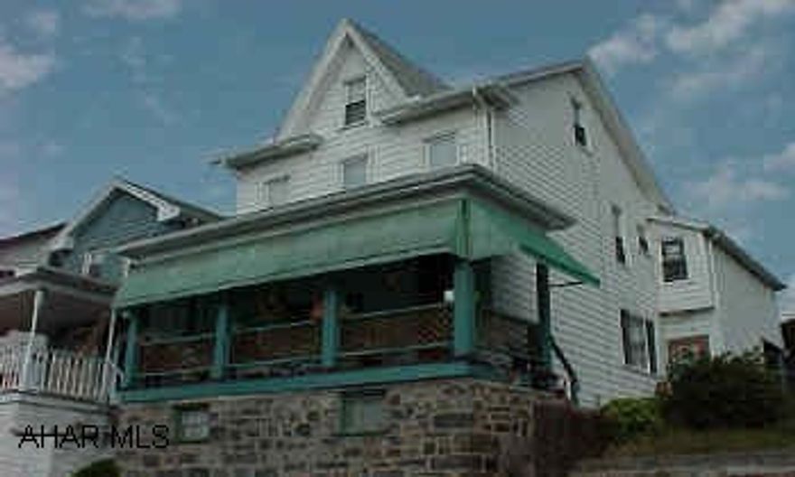 Large 4+br house with newer mechanics throughout. Newer roof, windows, furnace, double fenced yard. Could be turned back into dupex.     Newer roof, windows, siding, and furnace. Nice yard and garage. Investors make an offer.