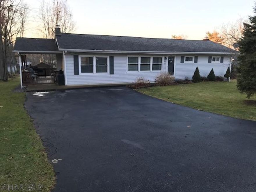 This home has many improvements and is tastefully decorated.  There's nothing to do except move in and enjoy this impeccably kept home.  All appliances are included, which saves on moving expenses. The bar in the large family room is great for entertaining.  Or, entertain outdoors on the spacious covered patio and roast marshmallows at the firepit. There's a finished room on the basement level that would be perfect for a 4th bedroom.  Lots of room for the kids to play on this level half acre+ lot on low traffic street.  This is a great place to unwind after a long day at work.  Check it out before it's gone!