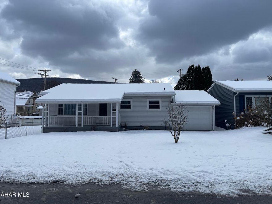 ONE STORY living in desireable East End location of Atloona.  This home offers 2 BR, 1 BA.  Beautiful HW floors, lovely Eat in kitchen (freshly painted) Home is situated on a LEVEL double lot.  Could easily make off street parking, but not necessary because it also offers 1 car garage and off street parking in front in driveway:)  Yard spacious enough to have picnics, and room for dogs to romp around