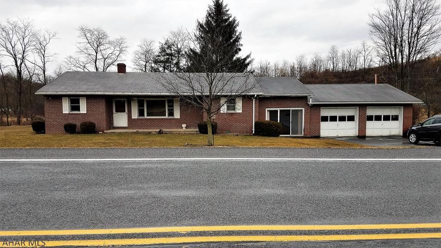 Come take a look at this hard to find, brick ranch home in the Chestnut Ridge School District. Situated on a gently sloping, 1.57 acre lot, this home features an open concept kitchen and dining room, a living room with a fireplace, a laundry room, a full bathroom, 3 bedrooms, a 1/2 bath and a den. The breezeway leads to the attached two-car garage. This house needs a little TLC to make it a home. It is located just minutes from I-99, providing easy access to Altoona or Bedford and the PA Turnpike. For the outdoor enthusiast, it's a short drive to Blue Knob State Park, Canoe Creek State Park or Shawnee State Park where you can enjoy hiking, skiing, fishing, swimming, camping or boating. Acreage and square footage are from the tax records. Buyer to verify. Property sold 'as-is'.