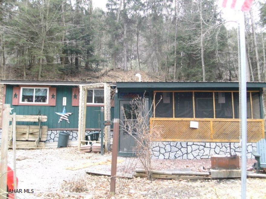 Wonderful getaway cabin with large bedroom, already set up. Priced to sell!