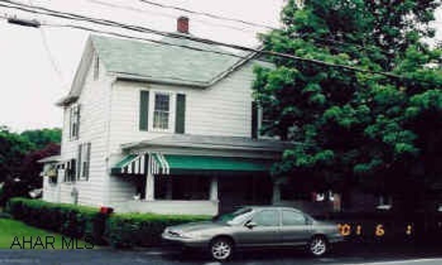 Very attractive 2 story. Remodelled and ready to move into. Hardwood floor, plaster walls, new windows, roof and vinyl siding.