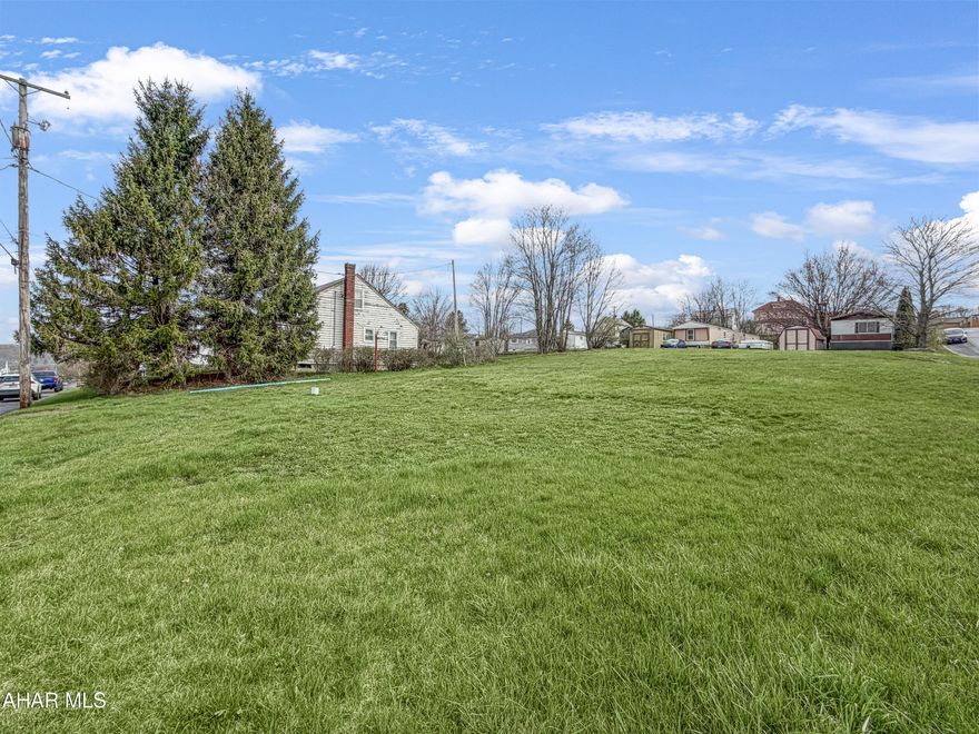 Great opportunity to build on this large, flat corner lot conveniently located at the intersection of Grant Avenue and Johnson Avenue! Just a short distance from the school, this property offers both convenience and accessibility. All public utilities are available on-site, making it ready for your next project. Whether you're looking to build your dream home or invest in land, this property is full of potential, don't miss out!