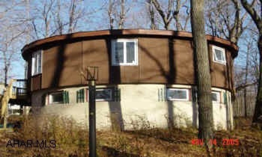 Blue Knob Resort. Unique home on golf course. Newly remodeled, open floor plan. Assoc. dues $120.00 yr. includes trash, use of pools & tennis court. Furniture can be purchased.