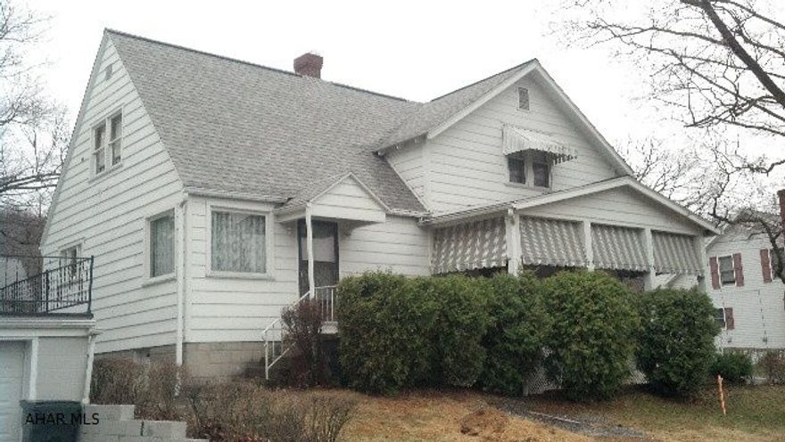 Great opportunity!  Really versatile depending what you want!  Commercial location- duplexed structure.  One side is a residence in move-in condition, the other side has been an apartment and a beauty shop... Could be renovated and used as a business office.   Great location- many possibilities.  Live in one side and hold your office in the other side!  Rent one side, or the entire duplexed property!