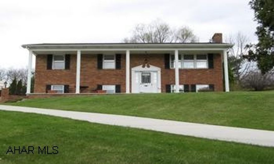 Beautiful 3 Bedroom Home on Nearly Half an acre with family room  in basement and large rear deck.