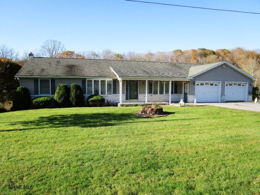 Very well maintained rancher with river frontage! Main level offers a living room, kitchen w/cherry cabinets and breakfast area, formal dining room, master suite w/m. bath & jet tub, additional full bath and half bath, two additional bedrooms, and a den w/built-in desk and cabinets. Full walk-out basement with a large family room, kitchen, full bath and storage room with overhead garage doors. Gas FA heat and central air-conditioning, two-car attached garage w/macadam driveway. Front porch, huge rear porch and deck overlooking the Juniata River, and partially wooded lot. If you like scenic river views, canoeing, kayaking or fishing, this property is for you. Great location in Snake Spring Township.