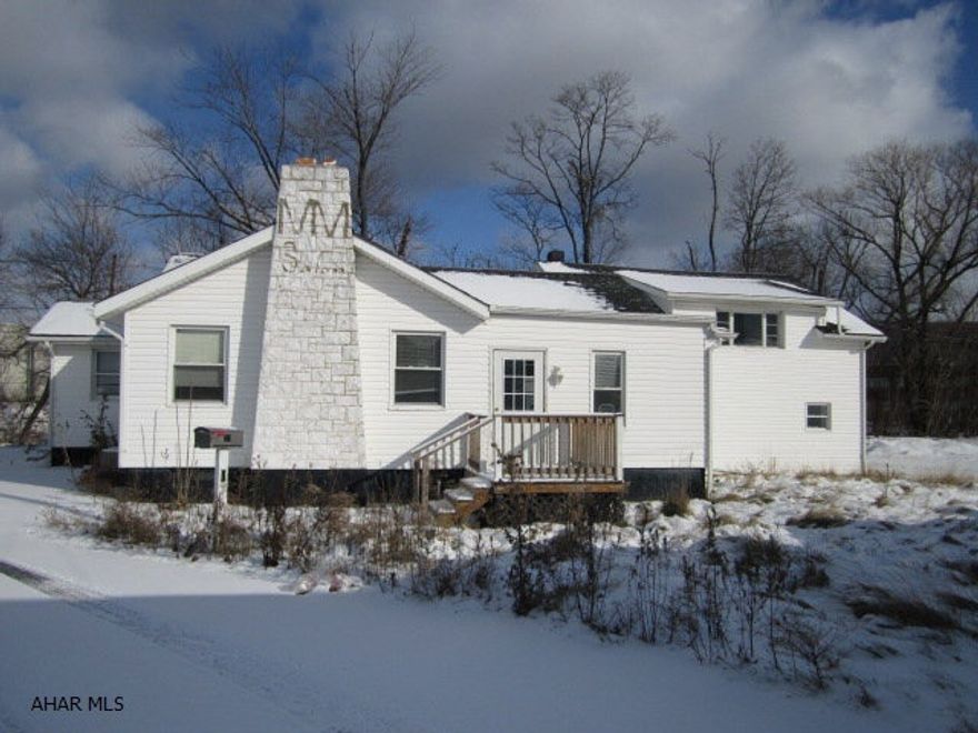 7 offices, one full and one half bath.  Macadam Parking.  1st floor - reception room and 5 offices, 2nd floor has two offices.  Total 1.15 baths, basement with finished room.