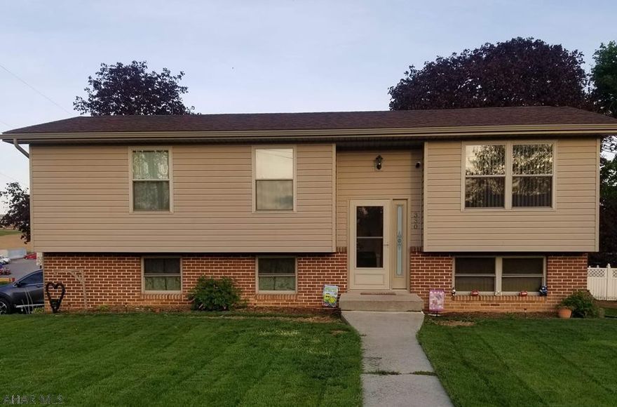 Beautifully updated 3 bedroom 1.5 bath in Martinsburg borough. This property was totally remodeled including: new roof, windows, gutters, plumbing, updated bathrooms,  updated bedrooms,  flooring and hot water heater. This property is move in ready with alot of room for entertaining. The first floor offers a livingroom,  eat in kitchen with Hickory cabinets and bar, living room, 3 bedrooms and full bath. The basement has a large family room, half bath, laundry and integral garage. The nicely maintained corner lot has a paved driveway into the garage along with a gravel area for additional vehicles and RV parking. Call listing agent for your private tour and more information. OPEN HOUSE THIS SUNDAY FROM 1230 TO 2PM.