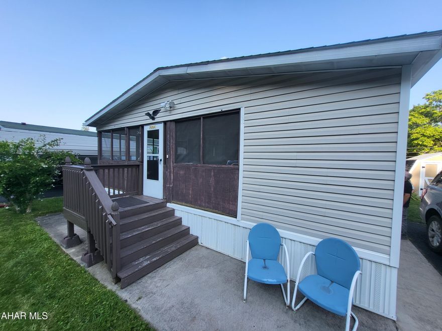 Beautifully maintained double wide in a 55+ community in Lakemont. This 2 bedroom 2 bathrrom offers 1 story living with large closet and private bath in the main bedroom. Large livingroom, public utilities, and shed with power,  Relax alone or entertain friends on the enclosed porch.  Call for a showing today. Contingent upon buyer being approved by lot owner.
Non-operational well on site.