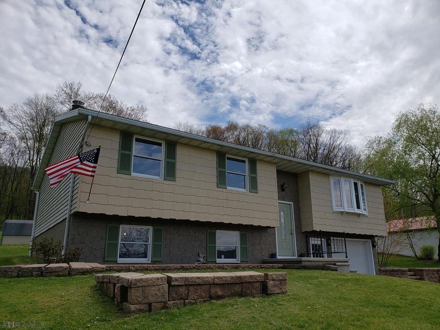 3 bedroom, 2 bath home in a rural setting in the Hollidaysburg school district. New carpet and paint on the main level. Harman pellet stove in family room on main level is included. Lower level family room with wood burning fireplace and full bath could be a great rec room/entertainment area.   .56 acres country living just minutes from the borough! View our 3D VIRTUAL TOUR!