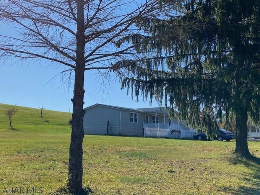 Spacious doublewide on 3.51 acres in Hopewell- master bedroom and master bath with garden tub and standup shower, two large bedrooms with walk-in closets, large covered porch, two sheds and gazebo, new windows in 2012, new siding and new metal roof in 2017-2018, propane for fireplace and stove, oil tank is full and propane tanks are full for the new owner, survey map is under documents