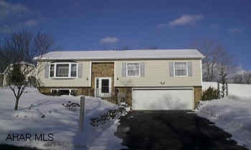 Beautiful 3 Bedroom Bi-Level, Oak Kitchen & Trim like new through out. Absoutley Spectacular landscaping done on this home. Low Taxes in Logan Township