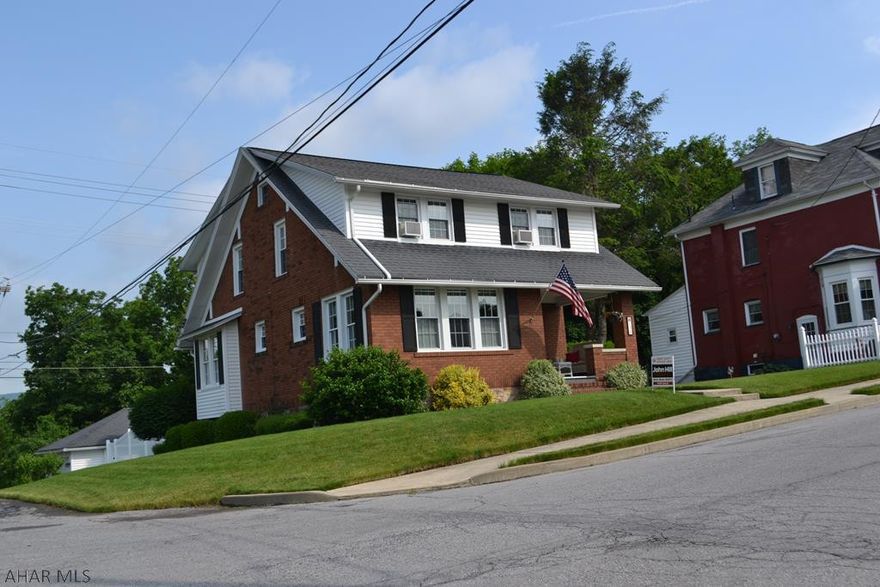 Meticulously kept brick and vinyl home for sale in Altoona. This home has so much to offer; newer modern kitchen and bath, beautiful woodwork, plush carpet, and 3 season room to sit in and enjoy the beautifully maintained back yard.