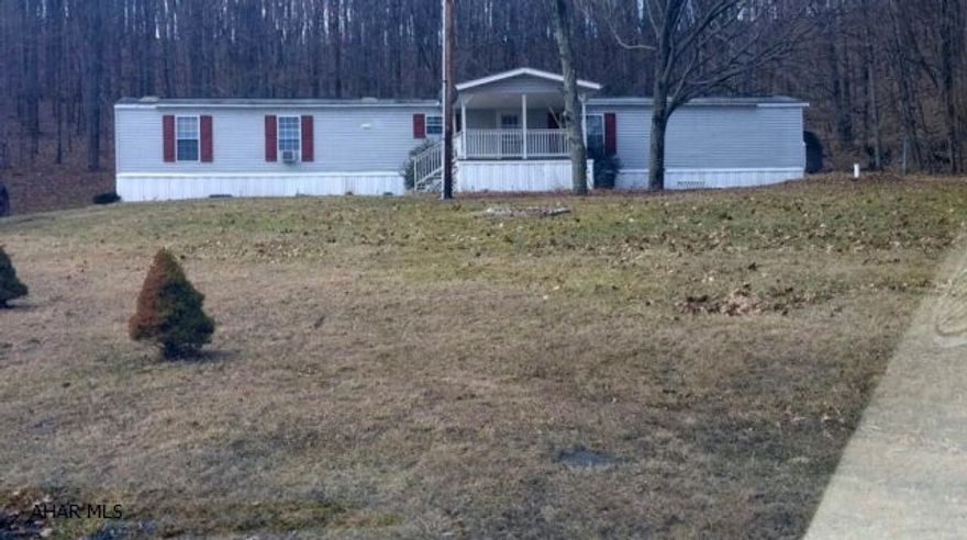 Single wide home with split floor plan, two bedrooms and two full baths in very good condition! Large eat in kitchen, skylights and a garden tub. One covered porch and a rear deck. Enjoy complete privacy on little over an acre near State Game Lands in Buffalo Mills.