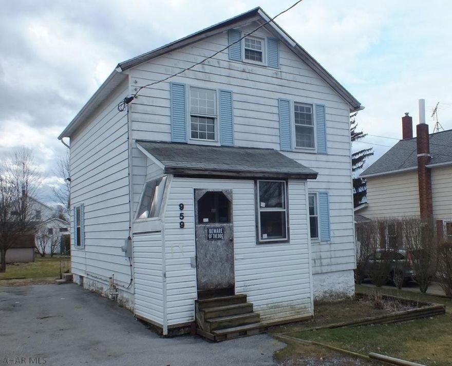 Colver area 2 story home in need of TLC. Large eat-in kitchen, formal living room, enclosed front porch and storage shed. Perfect for Investors.