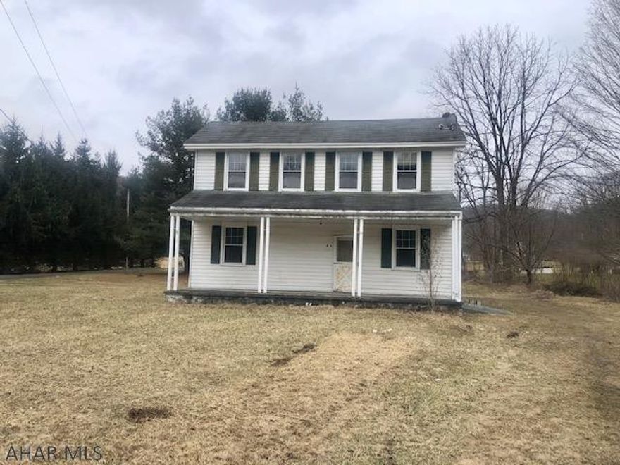 Two story home on a level .92 acre lot in Chestnut Ridge School District.   Property is in need of a full rehab as first floor has been cleared to the studs.   Cash or conventional/rehab loan only.