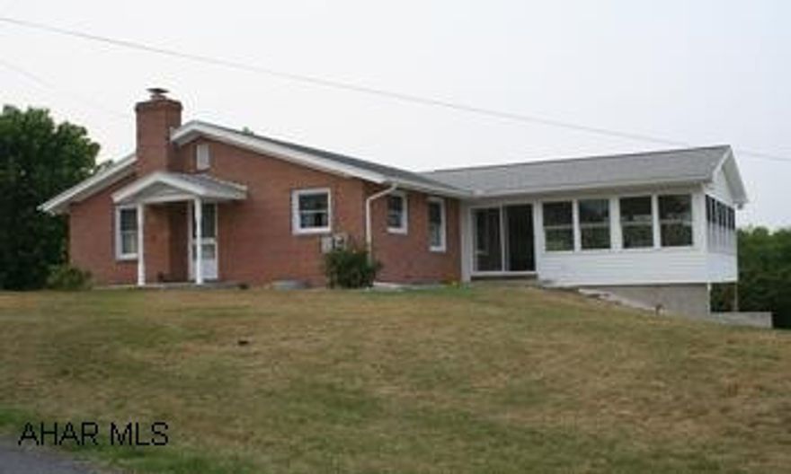 Charming brick house located in country setting with views of the mountains. Charming brick house located in country setting with views of the mountains. 2BR/1 full 1 unfinished half BA, Eat-in kitchen with Pergo floors, LR, spacious family room with light and airy ambiance, large yard. Heat pump and thermal glass windows.