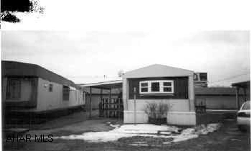 Mobil Home Good Buy-replacement windows, newer carpet, kitcen appliance, nice deck & shed.
