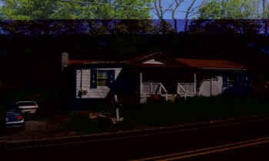 Sold as is where is.  See listing agent for addendum.  Handyman special!  bungalow on .459 acres.