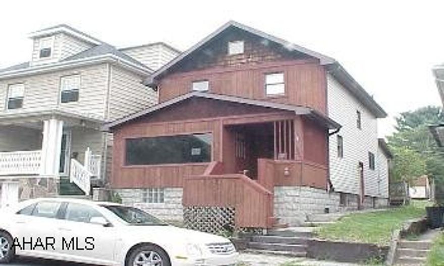 Needs TLC.  Off street parking off alley. Needs TLC.  Off street parking off alley.