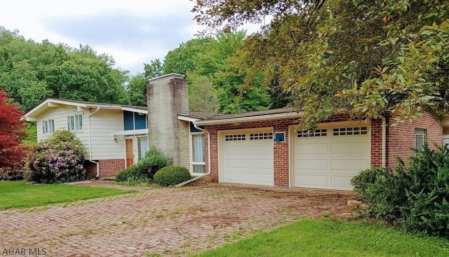 4 Bedroom, 2.5 bath home with an attached 2 car garage and underground dog fencing that is still under warranty.  Raised beds in garden, fruit trees, strawberries blooming around the patio. Brick driveway, pathways and patio.  Great backyard for entertaining or relaxing.