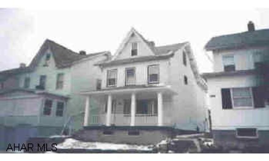 White 2 story/alum siding Nice kitchen & bath, fenced lot, 2 car garage, new front porch & furnace.  Hot tub stays @ full price.  Seller must find suitable housing.