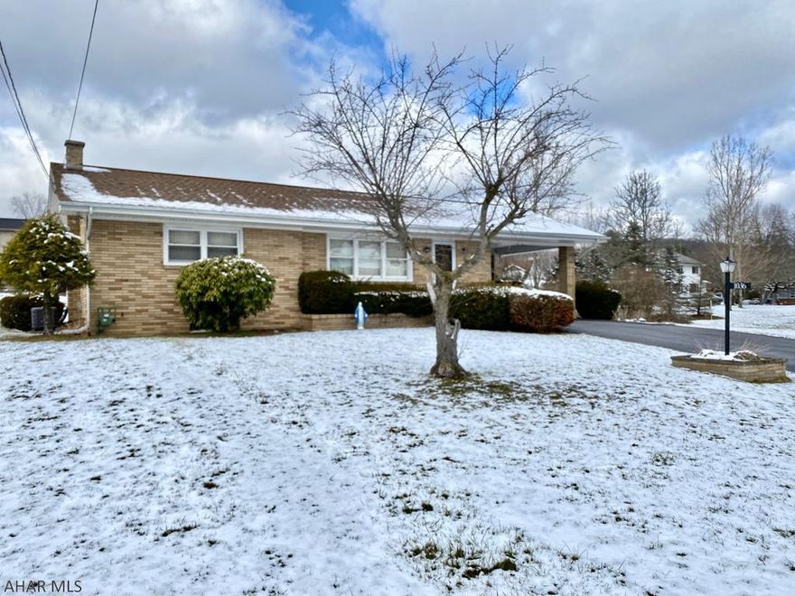 Solid and well cared for brick ranch on big .66 Acre lot in Eldorado. This adorable 1 story home has a nice open floor plan,Beautiful hardwood under carpet, big closets, and plenty of counter and cabinet space. Lower level is a wide open entertainment room with a bar area and separate utility and laundry room. 3/4 bath in the basement, Central Air, oversized driveway, carport, updated mechanics and roof, front porch, shed, and even a great view! All in a great location of Logan Twp. Put your decorative juices to work and make it yours today!
