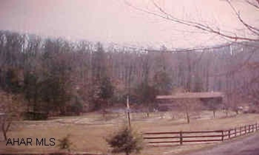 Homers Gap, beautiful, peaceful setting. Gently rolling pasture w/fish pond, 2 stables, fruit trees, fountain w/ Koi pond, above ground pool. Tastefully remolded house that needs finishing touches.  Homers Gap, Beautiful, peaceful setting. Gently rolling pasture w/ fish pond, 2 stables, fruit trees, fountain w/ Koi pond, above ground pool. Tastefully remolded house that needs finishing touches.