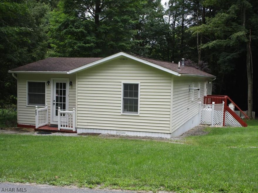 Spacious, affordable mobile home with addition for full time living or getaway.  Double lot affords lots of space outdoors as well.  Two bedrooms, one on either end of the home offers privacy for all.  Bonus room was a third bedroom could be an office or storage room. It accesses to the back deck.  Living room has a pellet stove and the addition uses a propane wall heater to keep you cozy through the winter months.  One huge shed with two additional ones will meet your storage needs.  Located in Glendale Yearound whose amenities include swimming pool, club house, tennis/basketball/ volleyball courts, dog park, playgrounds and more.  Adjacent to Prince Gallitzin State Park / Glendale Lake and six miles from Rock Run ATV Park.  Cash only.  Seller doesn't have title but it can be procured.