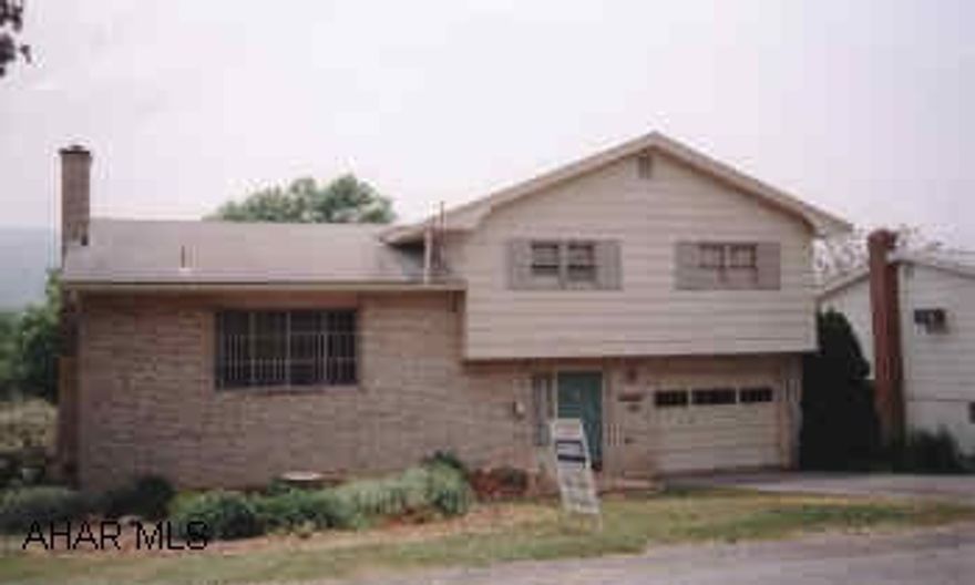 WELL MAINTAINED. LOTS OF LIVING SPACE, LOTS OF STORAGE, LARGE LEVEL YARD. NEW DECK.