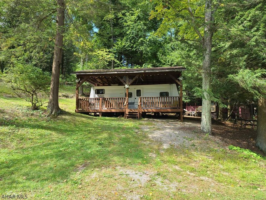 1999 Camper with pavilion and deck for sale in Glendale Yearound. This camper has 1 bedroom and 1 bath and is clean and in great condition. It sits on 1 lot and there is a shed included as well. Glendale Yearound is a gated community located within minutes of Glendale Lake and Prince Gallitzin State Park. Community pool, tennis, basketball, and more.