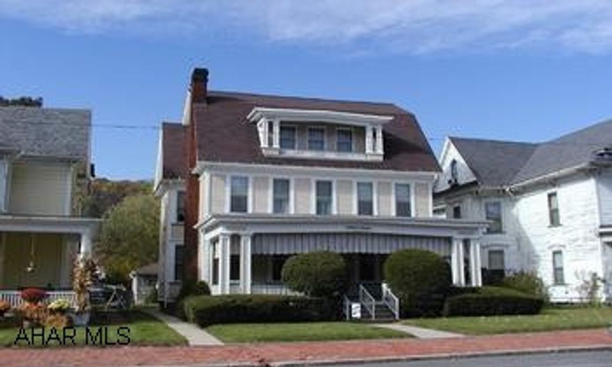 Stately 2 1/2 story home with many extras including elevator and spiral staircase. Fireplace. 4 bedrooms, 2 1/2 baths. Finished attic. 2 car garage. Stately 2 1/2 story home with many extras including elevator and spiral staircase. Fireplace. 4 bedrooms, 2 1/2 baths. Finished attic. 2 car garage.