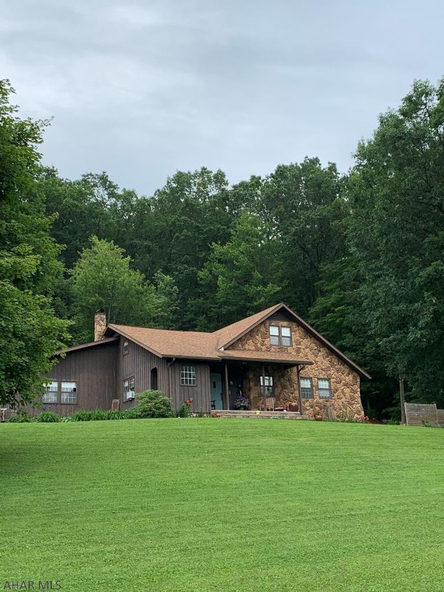 Lovely 1 1 /2 story stone and wood sided home in a beautiful country setting, located close to historic downtown Bedford. Fireplace in the living room, large sunroom, cedar lined closet, lots of extras!