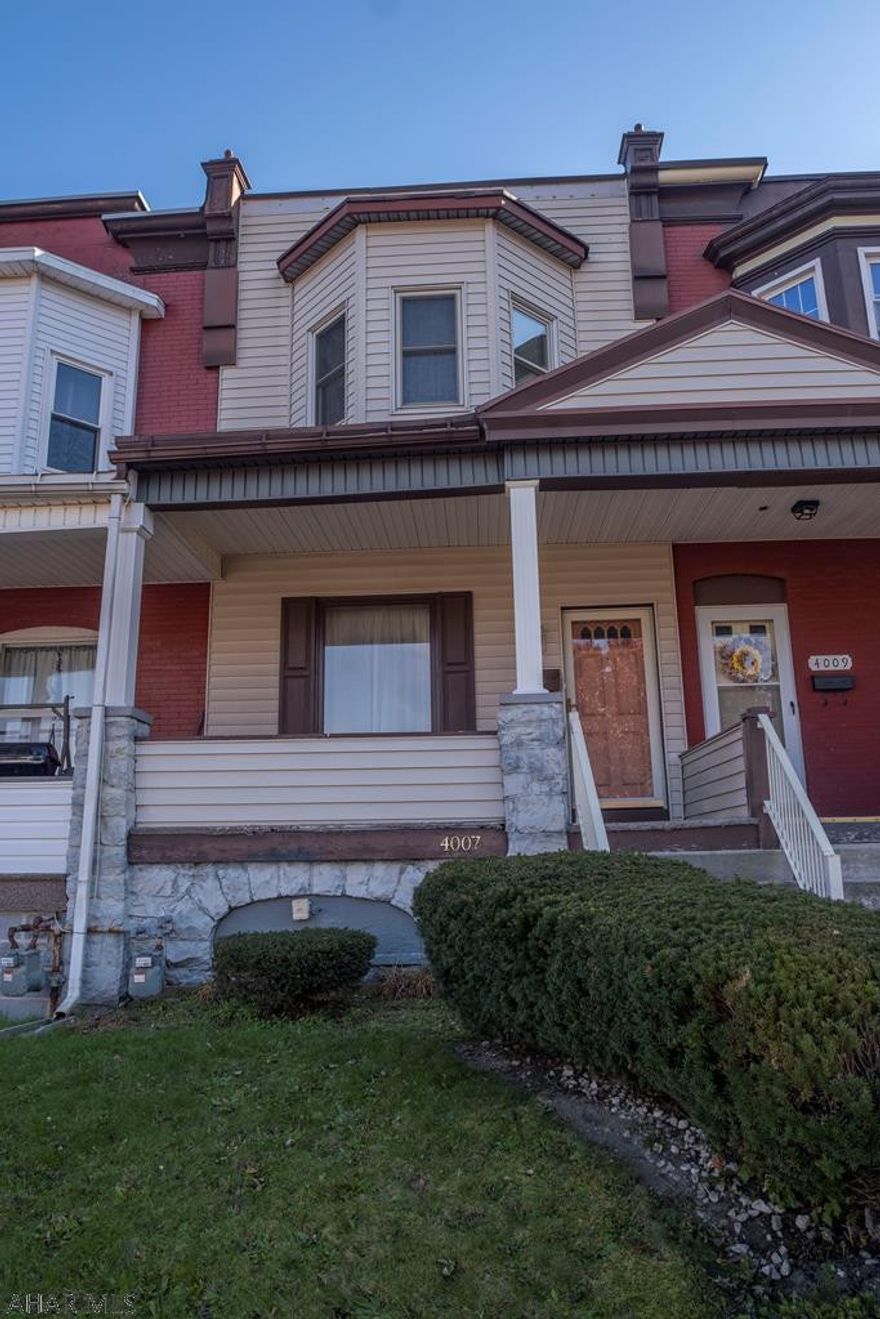 Spacious well maintained townhome.  This home offers tons of square footage. Large eat in kitchen with Oak cabinets. Vast living and dining room.  3/4 bath and laundry on the first floor. Second floor has 3 large bedrooms and a full bath. Off street parking behind the home . Home would make a great starter home or a great investment opportunity. Schedule a tour.