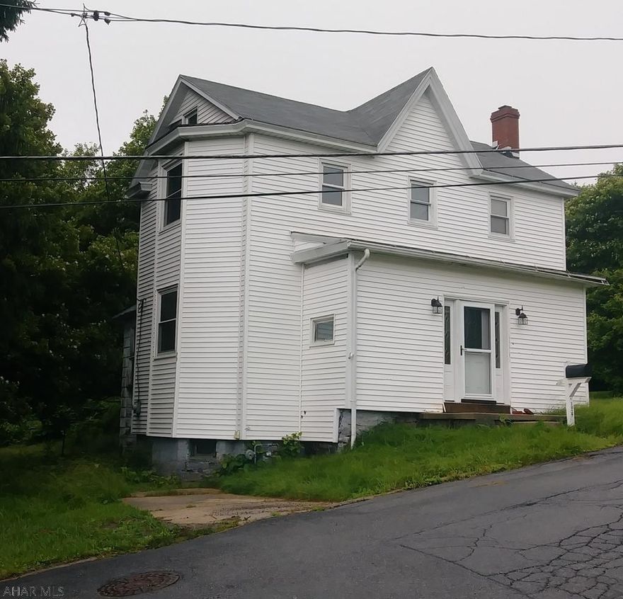 A welcoming  Two story 3 bedroom 2 bath home in Gallitzin awaits. Nice eat in kitchen and a very cozy family room across from the living room or could be a dining room. Laundry and bathroom on the main floor are a great convenience.