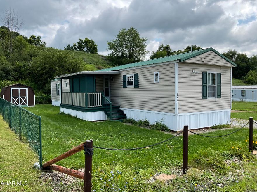 Simplified living in Logan Ridge Mobile Home Community in Tyrone! This mobile home on leased land features 2 bedrooms and 2 bathrooms. The kitchen features good counter space opening up to a nice living room area. This includes the shed on a flat lot. Buyers must successfully complete a lot lease application.