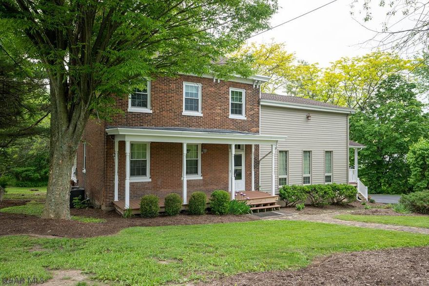 Charm and character abound in this farm house style home with modern addition. Plenty of space for everyone...from the bedroom/bonus rooms on the 3rd floor, to the loft, to flex space on the main level.....you can have it all. Perfect areas for a home office or schooling.  New kitchen updates include Quartz counter tops, backsplash, cook top and sink....double wall ovens add to the convenience, 4 bedrooms, 3 bathrooms and a 2nd floor laundry. Large garage was added in 2017...and there is an electric car hook-up.