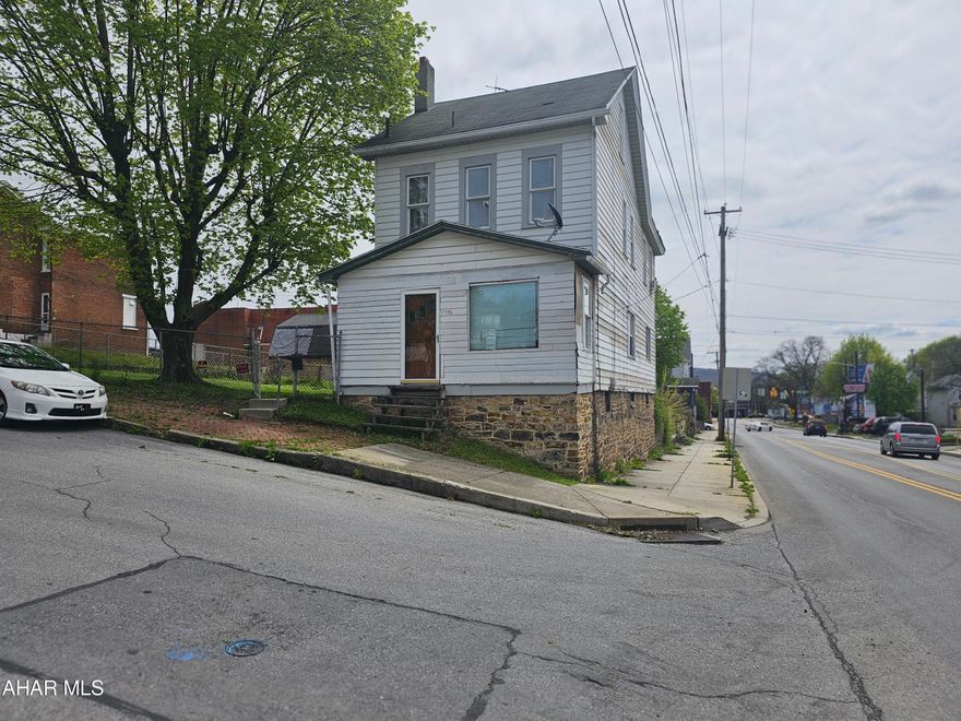 Large 2 story home with 3 bedrooms and a full bath in need of some TLC. Home has large living spaces .Yard is completely fenced in. Great for investors or flippers. Schedule a tour today.